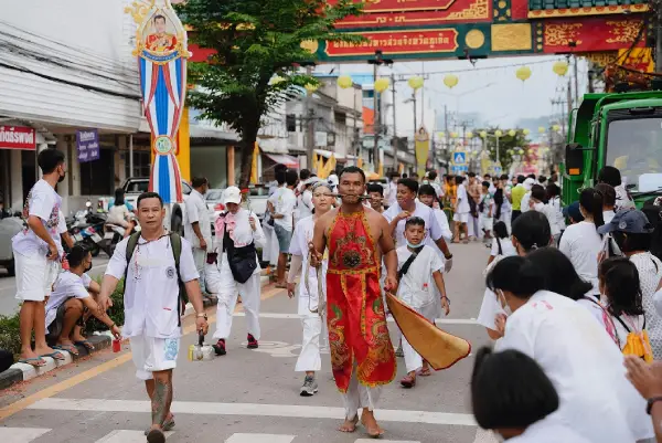 a festival in the streets of Thailand - cheap tropical places to visit